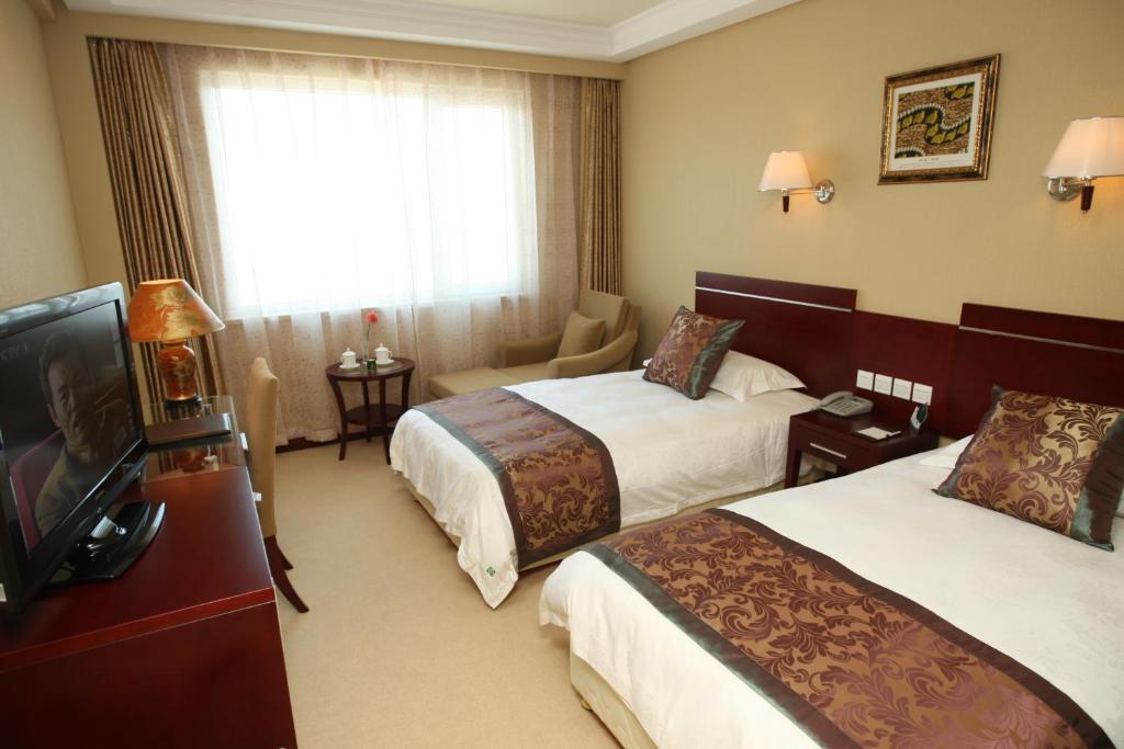 Overseas Chinese International Hotel Qingdao Exterior photo