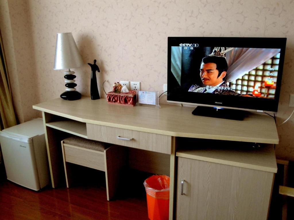 Overseas Chinese International Hotel Qingdao Room photo